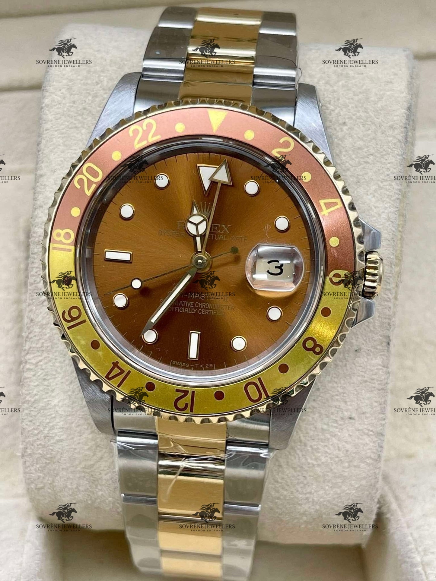 Pre-Owned Rolex GMT-Master II – Steel & Gold with Brown Dial Ref 16713 | Authenticated by Sovrène