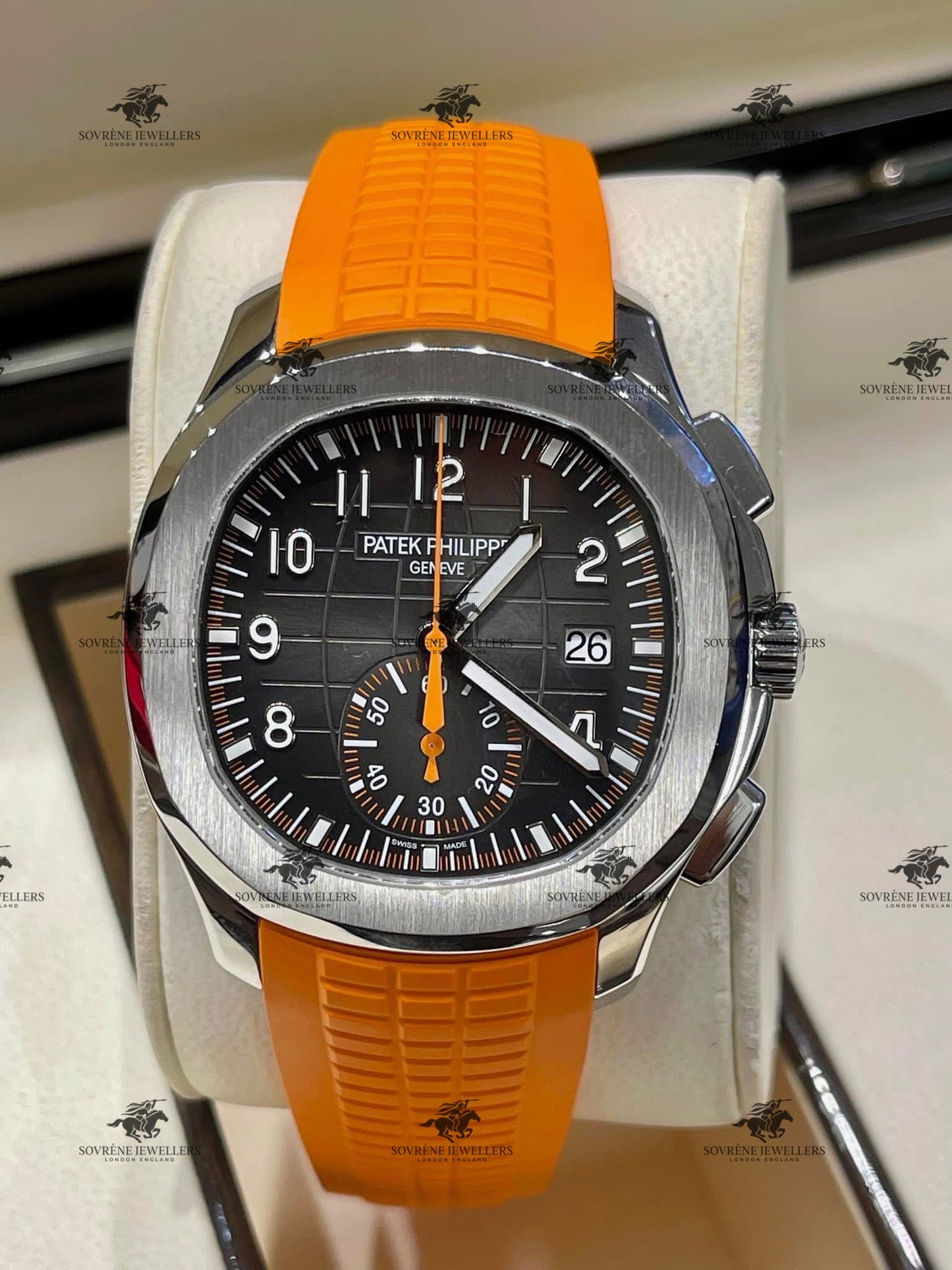 Pre Owned Patek Philippe Aquanaut Chronograph 5968A Stainless Steel Black Dial with Orange Strap | Authenticated by Sovrène
