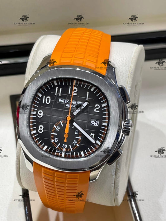 Pre Owned Patek Philippe Aquanaut Chronograph 5968A Stainless Steel Black Dial with Orange Strap | Authenticated by Sovrène