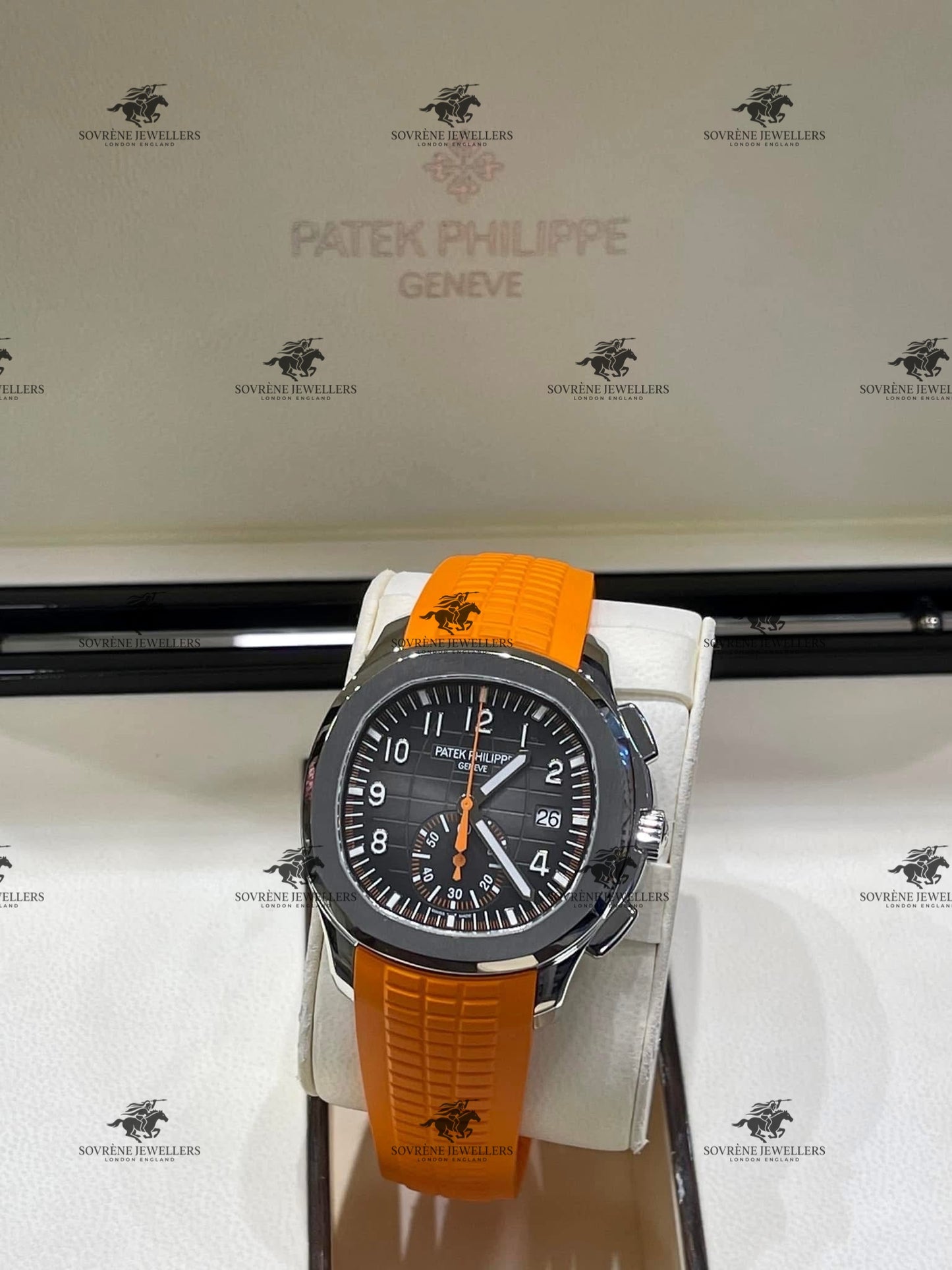 Pre Owned Patek Philippe Aquanaut Chronograph 5968A Stainless Steel Black Dial with Orange Strap | Authenticated by Sovrène