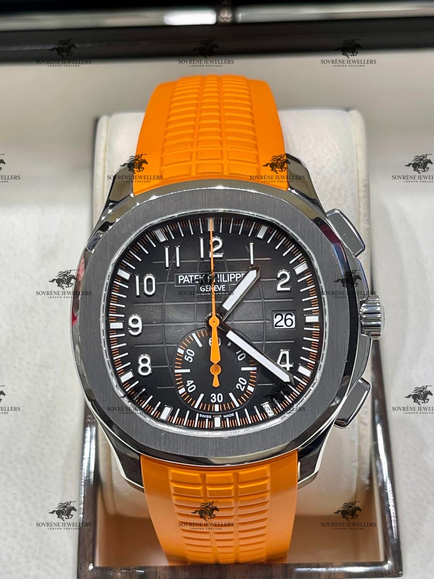 Pre Owned Patek Philippe Aquanaut Chronograph 5968A Stainless Steel Black Dial with Orange Strap | Authenticated by Sovrène
