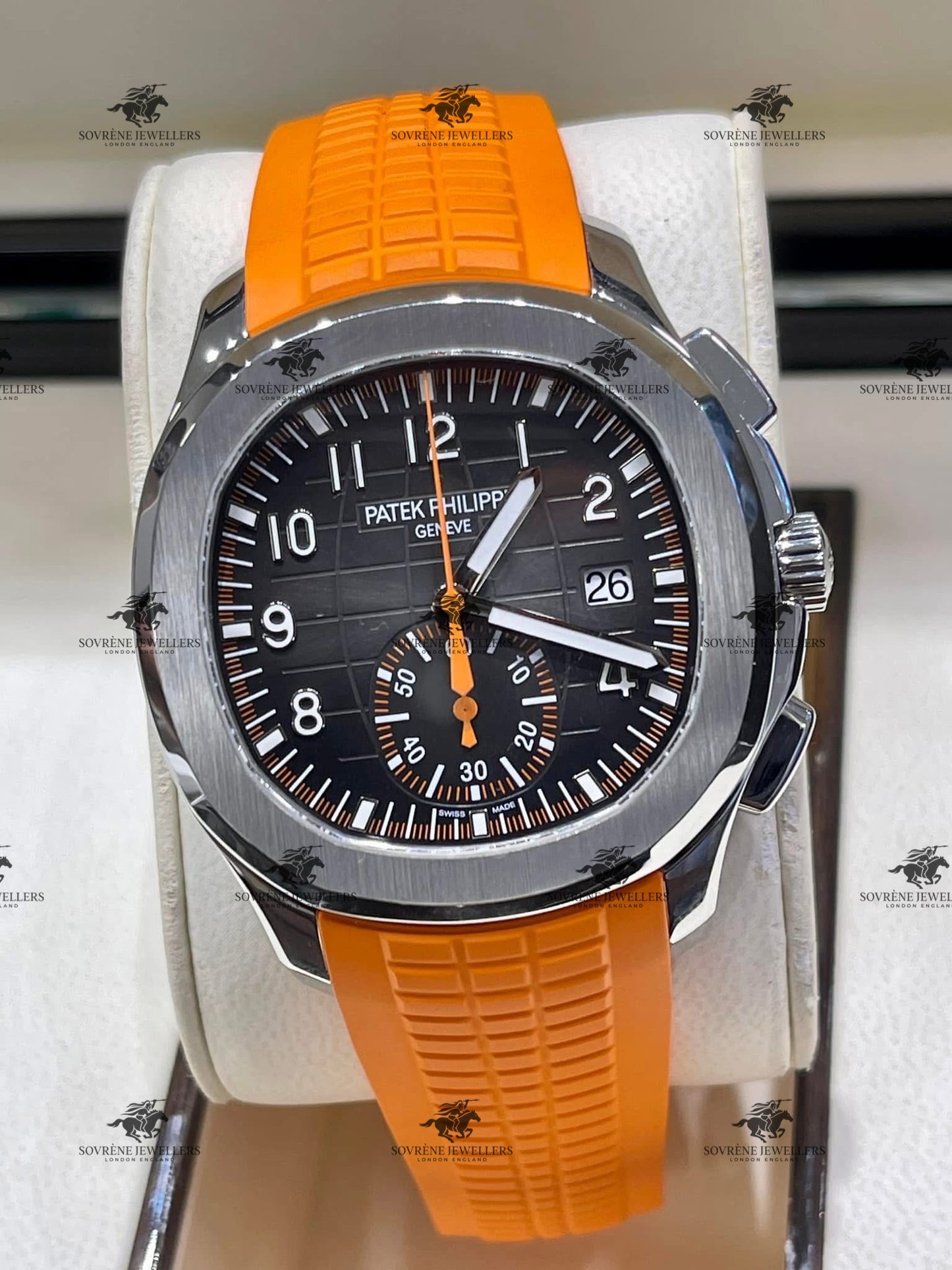Pre Owned Patek Philippe Aquanaut Chronograph 5968A Stainless Steel Black Dial with Orange Strap | Authenticated by Sovrène